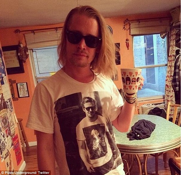 Macaulay Culkin wearing a picture of Ryan Gosling wearing a picture of Macaulay Culkin. The universe is collapsing in on itself.