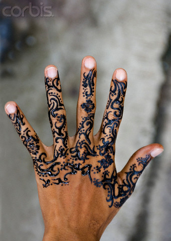 Henna tattoo on a tourist, Bali