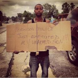 markruffalo:  On Aug. 9th, 2014 a Ferguson, Missouri police officer racially profiled and fatally shot 18-year-old Michael Brown as the teen stood with his hands in the air. His family and community members are calling it an execution. Racially-motivated