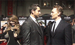 tomhazeldine:  Zachary Levi and Tom Hiddleston having a dance off on the red carpet 