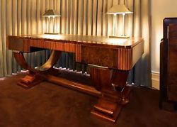 danismm:  Art Deco Office Desk   That’s so totally over the top it looks like the stand that Stalin’s coffin should have been sitting on during his state funeral. 