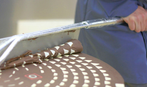 itscolossal:  Hidden Geometric Patterns Gradually Revealed inside Giant Chocolate Cylinder