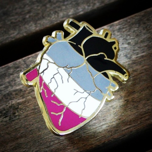 theasexualityblog:syppah:Ace Pride Anatomical Heart enamel pin. Click “source” below to find it on e