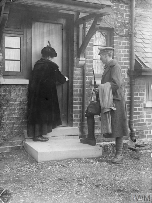 A soldier of the Sherwood Foresters (Nottinghamshire and Derbyshire Regiment) home on leave with his