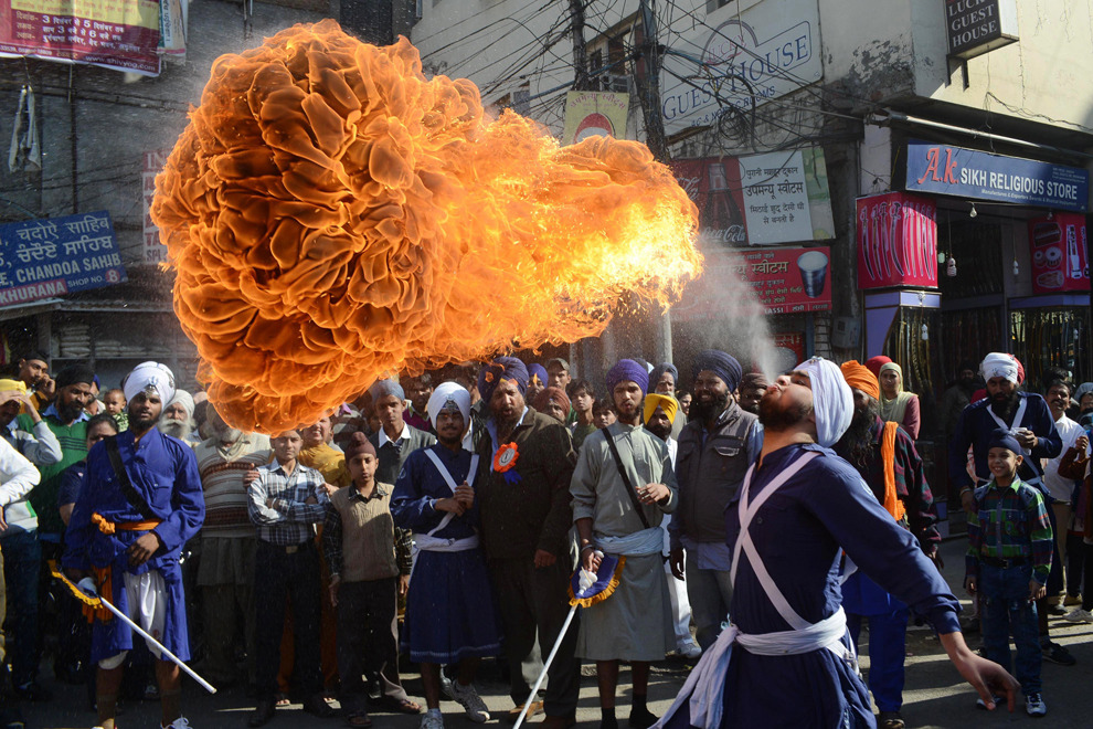 Dragon in training (an Indian Sikh Nihang [warrior] performs a fire breathing act