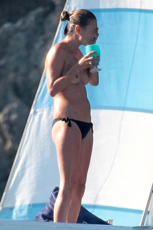 toplessbeachcelebs:  Kate Moss (Model) topless on a yacht in St. Tropez (August 2012) 