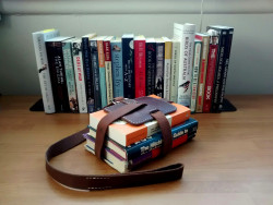 42books:  Hand-made leather book strap. 