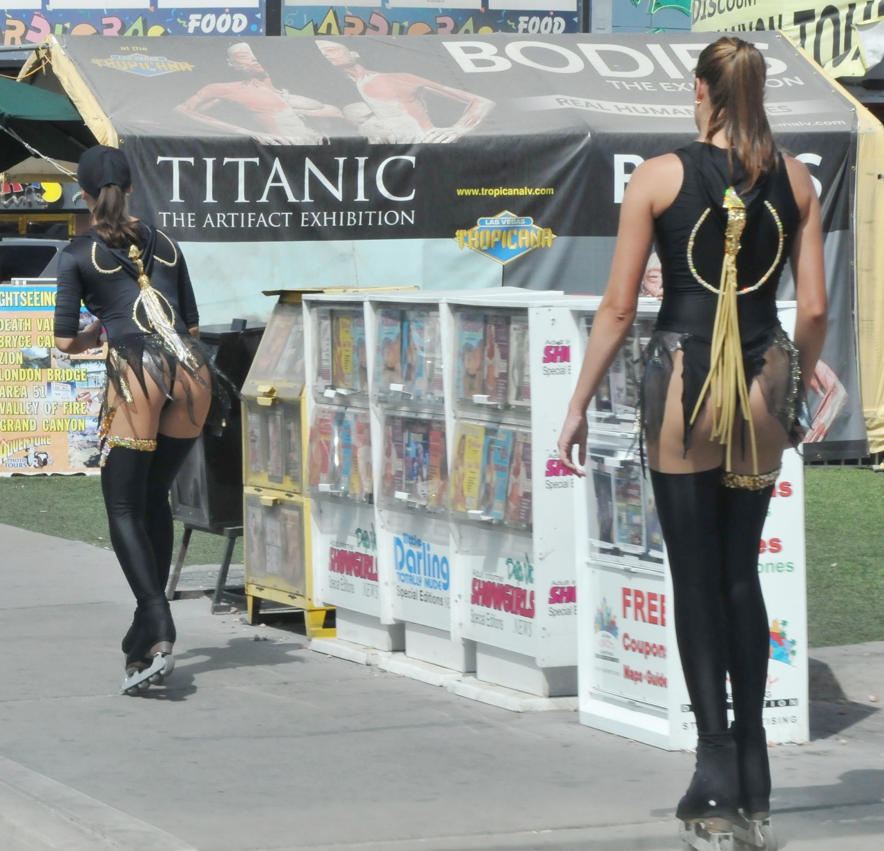 These girls work in one of the shows and skate around handing out discount coupons.