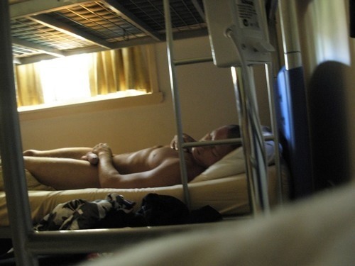 dickspy:  Drunk sleeping boy in a hostel