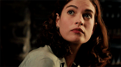 lilyjamessource:Lily James as Juliet Ashton in The Guernsey Literary and Potato Peel Pie Society (20