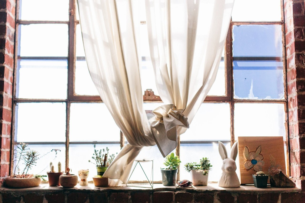gravity-gravity:  Workspace with exposed brick via Apartment Therapy