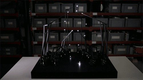 itscolossal:WATCH: A Kinetic Sculpture of 15 Moving LEDs Mimics a Walking Person [video]