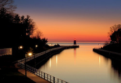 raider27:  onlymichigan:  Sundown on Lake Michigan in Charlevoix by Thomas P Mann on Flickr.  Pine river Chanel and the Michigan light
