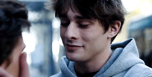 Eliott + Holding Lucas Face While Kissing Him
