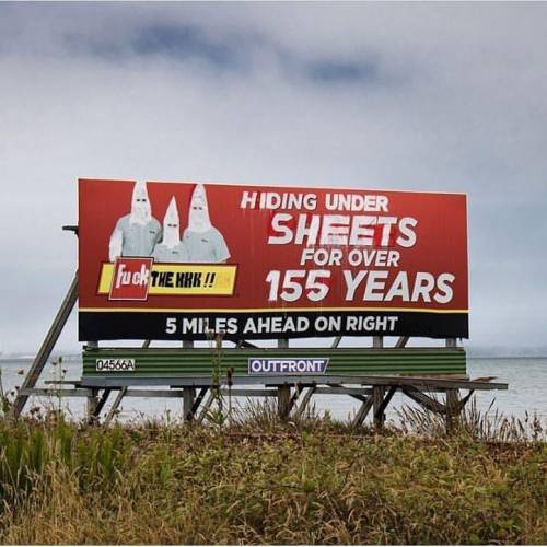 “Hiding under sheets for over 155 years. Fuck the KKK” Anti-Klan billboard vandalism alo