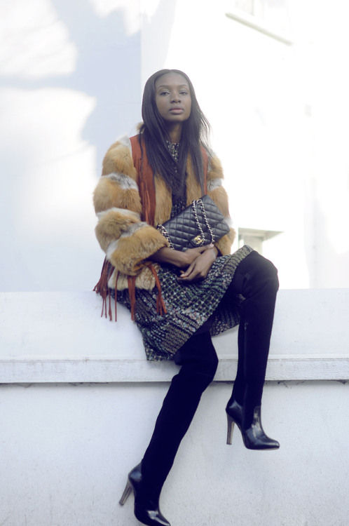 natashandlovu: Natasha Ndlovu wearing vintage fur on her blog.   Forever21 vest . Vintage 