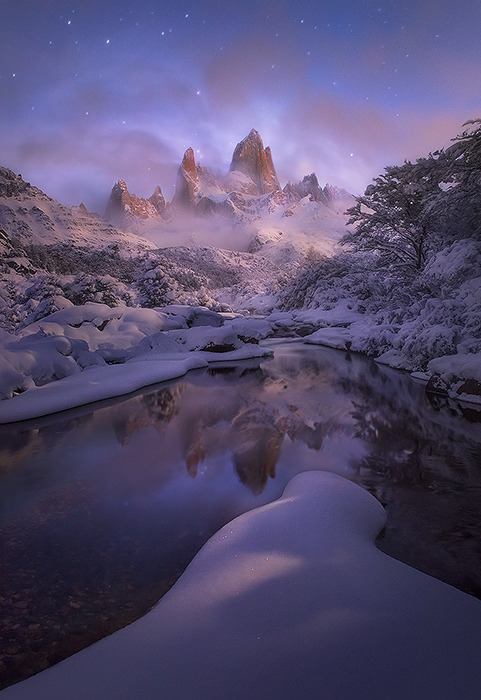 softwaring:  Soft moonlight illuminates a clearing Fitz Roy peak in Patagonia and Light reflected in a winter stream beneath Fitz Roy Peak. Marc Adamus 