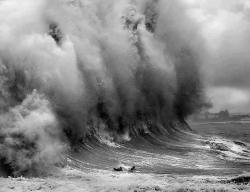 cluubsoda:  nuno-blue:  ~ Not photoshopped at all. This photo was taken during a real bad storm in Cornwall UK. …And yes those crazy bodyboaders survived!!  HOLY COW 