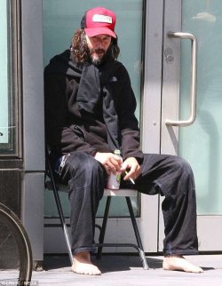gaspack:Keanu Reeves barefoot in brooklyn drinking watermelon juice while smoking a cig.