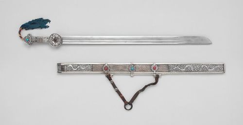 art-of-swords:Sword with ScabbardDated: 18th–19th centuryCulture: TibetanMedium: iron, silver,