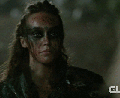 COMMANDER LEXA LETTING OUT A TEAR  BEFORE TURNING AROUND, LEAVING CLARKE ALONE