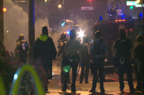 weather-underground:  anarcho-queer:  Captain Johnson Breaks Promise, Uses Tear Gas And Military Vehicles Against Ferguson Protesters August 17th, 2014 Captain Johnson broke a direct promise he made on Saturday when officers and SWAT under his control