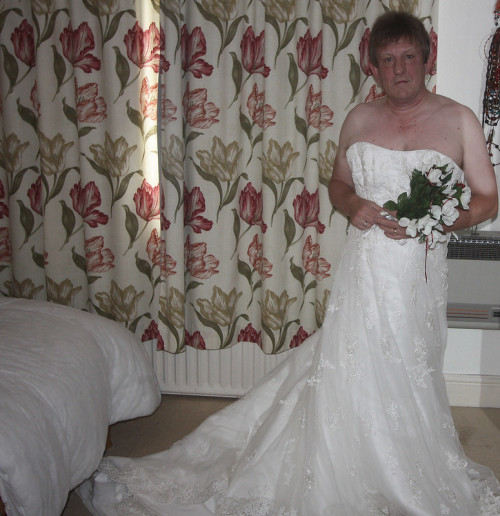 This lovely bridal crossdresser is Sophie.