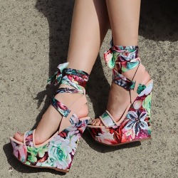 ideservenewshoesblog:  Dollhouse Playful Floral Leg Wrap Wedge Sandals