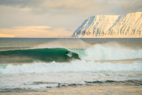Sam Hammer surfing Iceland by ChrisBurkard