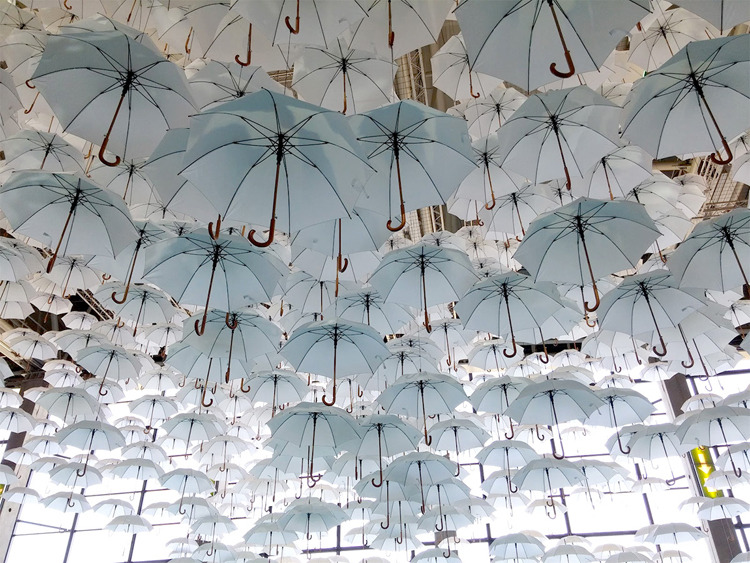 praying:  A Cloud Made of 1,100 Umbrellas by Kaisa And Timo Berry
