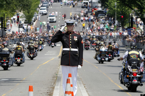 US Marine salutes Rolling Thunder as they make their way to the Vietnam War Memorial last Memorial D