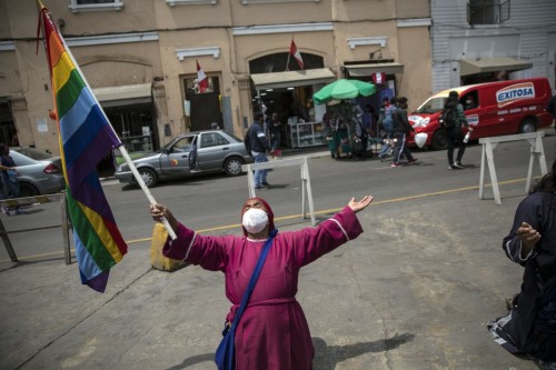 Dionisia Jorge, 71, member of the Israelites of the New Universal Pact, kneels in prayer outside the