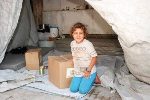 This photo was taken in Aleppo, Syria, a few weeks ago.  The girl pictured was given food by one of 