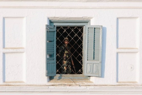 A solider looks over Durbar square, Kathmandu, Nepal 2013. . This is one of my favourite photos, but