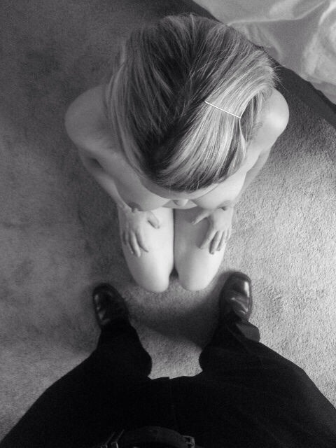 justsomeholestofill:  This is how a woman should great her owner whenever he enters the room.  It is her place to serve him and to put him above herself.  Devotional Training: Teaching it to serve.