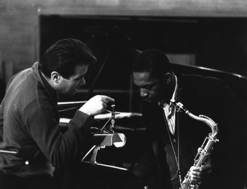 onedownoneup:Bob Thiele (Impulse Records) talks to John Coltrane at a recording session in 1963.