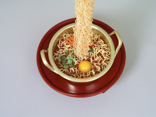 martinekenblog:  Hyper-Realistic Resin Sculptures of Dangling Korean Noodles Artist Seung Yul Oh recreates common Korean noodle dishes, but with a spectacular twist. Using synthetic resin, a pair of chopsticks float 12-feet-high, with dangling noodles