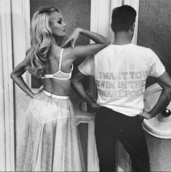 forthosewhocravefashion:  Candice Swanepoel standing next to a guy who’s shirt says: “I want to swim in the Swanepoel” 