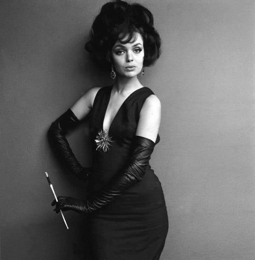 Madeleine Rampling modelling a black dress with brooch, John French (1907-66), London, 1960s © Victo