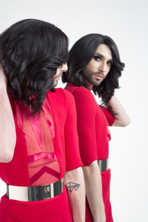 Conchita wears an Aigner dress from the Milan Fashion Week/Fall 2014 in the booklet of her album “Co