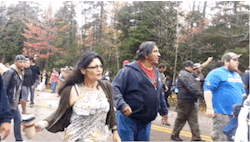 memorialparkvignettes:  All taken from an unembeddable Facebook video. The coffee-thrower is my hero! The Mi’kmaq of Elsipogtog are resisting fracking on their unceded territory. Here is an article/video about the blockade. The RCMP attacked the camp