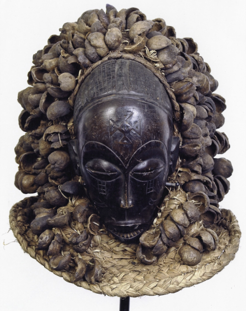 historyarchaeologyartefacts:Pwo mask, used by a young, initiated woman ready for marriage. Angola, 1