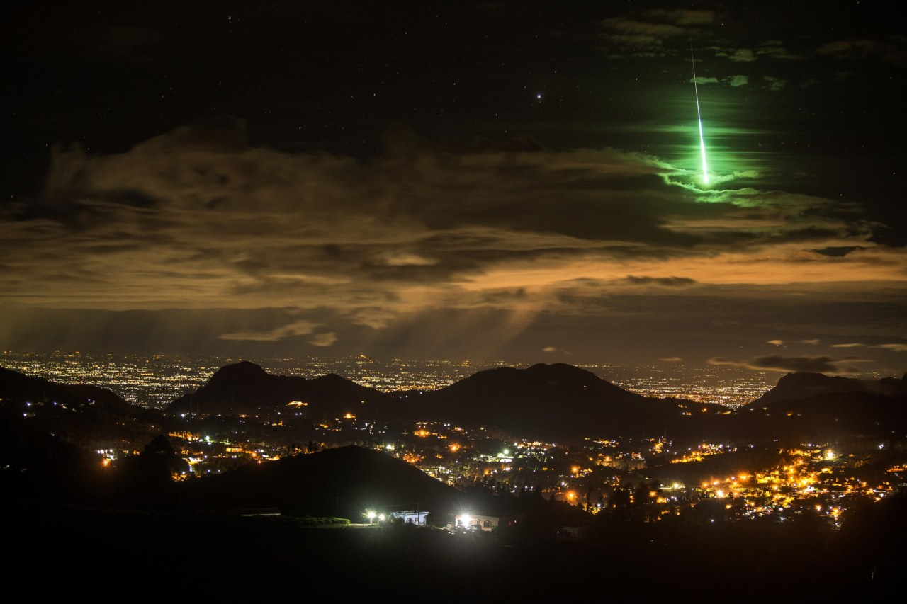 wired:  Now that’s a perfect shot.Read More: A Brilliant Green Meteor Lights Up