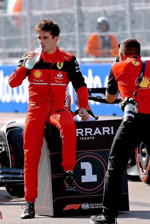 MIAMI GARDENS, FL - MAY 07, 2022: Charles Leclerc drinks a sip of water after taking the P1 position