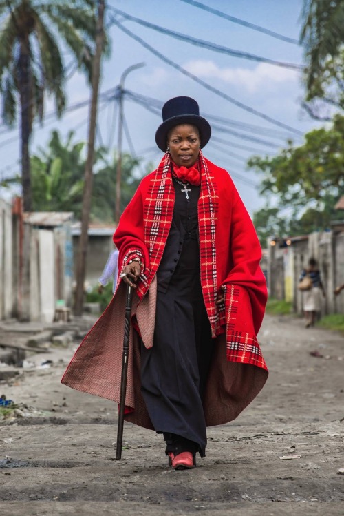 camewiththeframe:In Kinshasa, Democratic Republic of Congo, women are wearingmenswear to make a stat