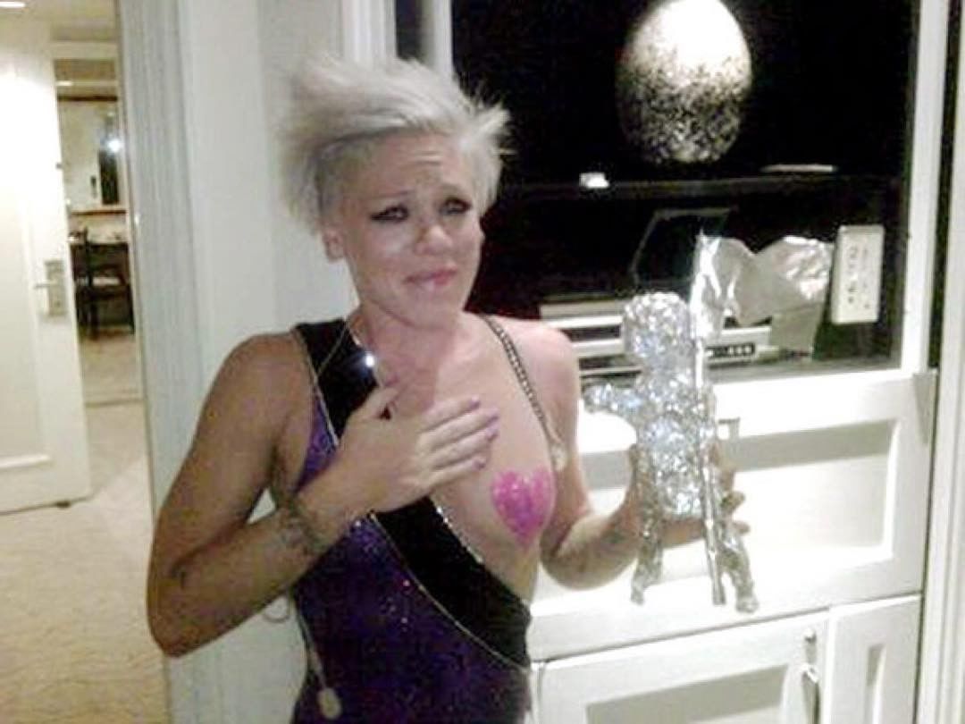 pinksource:P!nk with her Moonman award made out of foil by Carey Hart in 2009 vs.