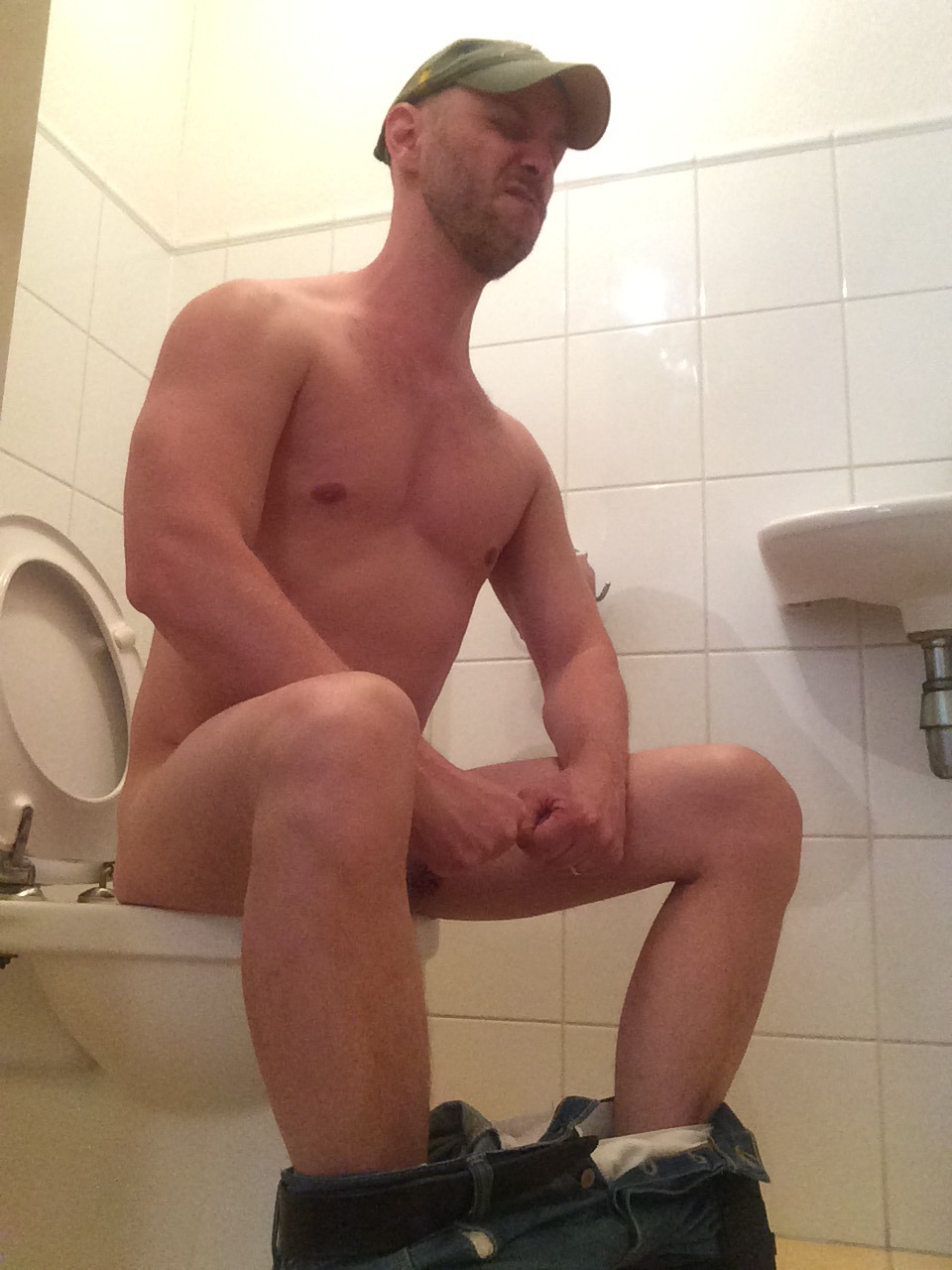 beuker71:  Taking a dump.   This guy is to fucking hot!!!!