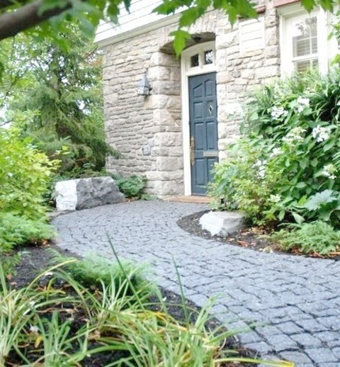 Natural Stone Pavers In MontrealAn Example Of A Small Contemporary Shade Front Yard Stone Garden Path.