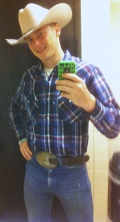 I bet this cowboy is smiling cause he is packing a huge redneck cock in his skintight jeans