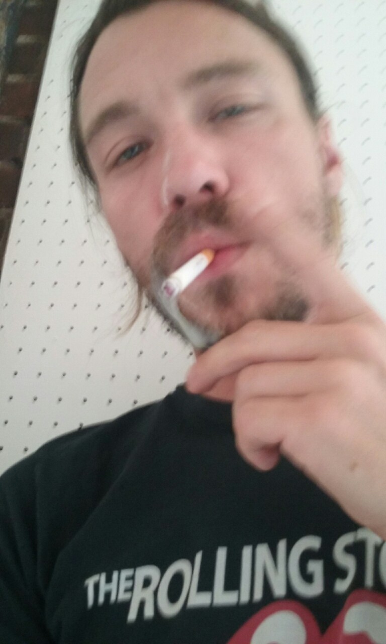 tattootodd80:  Enjoying a smoke with my face covered on cum